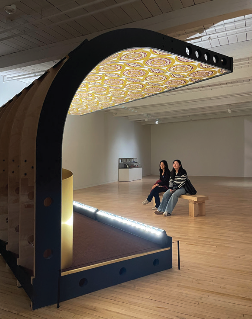 Katie Yang ’25 and Aaliyah Wang ’25
study a piece at Mass MoCA.